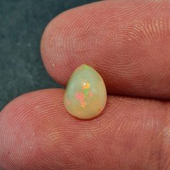 Opale Etiope 'Welo' Naturale Forma Goccia Piatto Cabochon Liscio Fatto a Mano 7x9x4mm 1,20 Carati 1pz