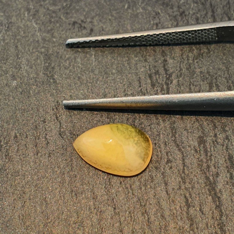 Opale Etiope 'Welo' Naturale Forma Goccia Piatto Cabochon Liscio Fatto a Mano 6x10x4mm 1,05 Carati 1pz