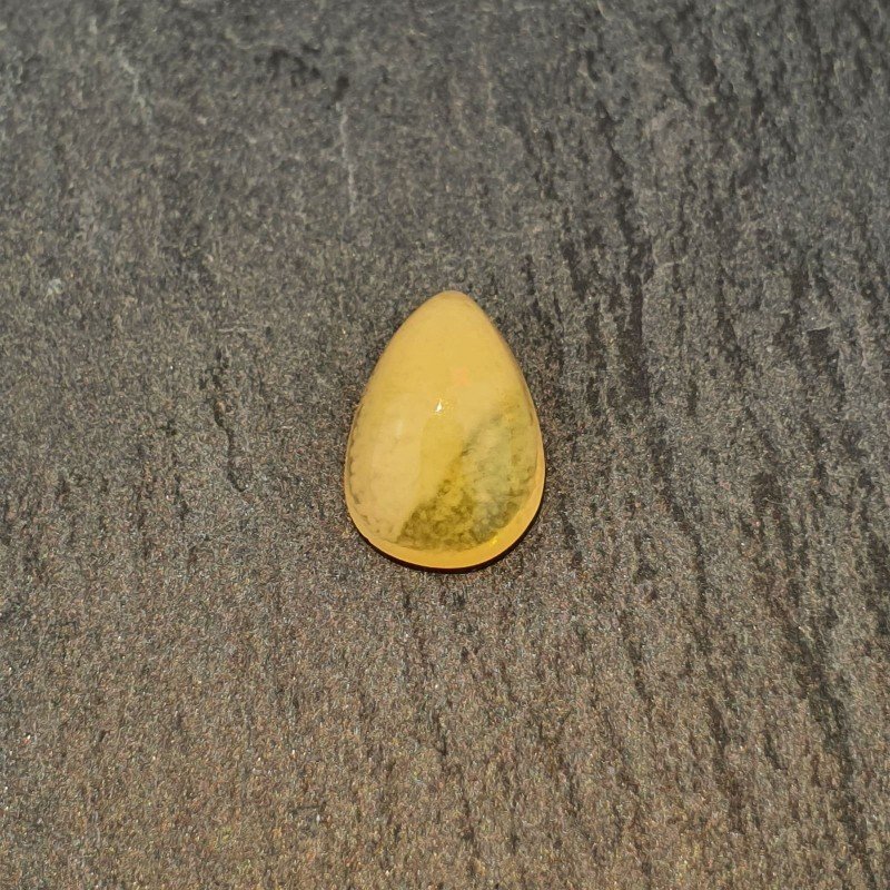 Opale Etiope 'Welo' Naturale Forma Goccia Piatto Cabochon Liscio Fatto a Mano 6x10x4mm 1,05 Carati 1pz