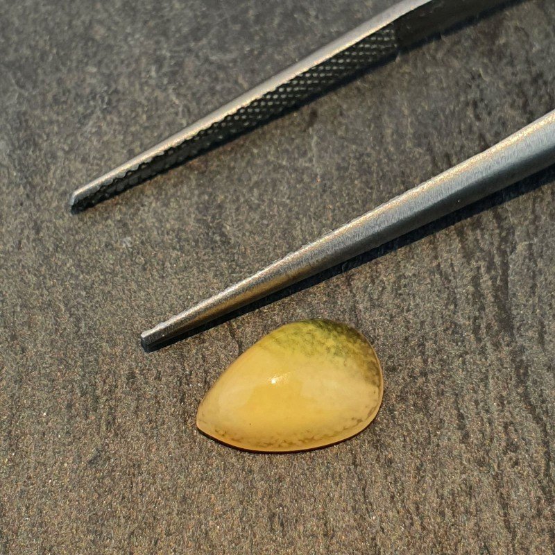 Opale Etiope 'Welo' Naturale Forma Goccia Piatto Cabochon Liscio Fatto a Mano 6x10x4mm 1,05 Carati 1pz