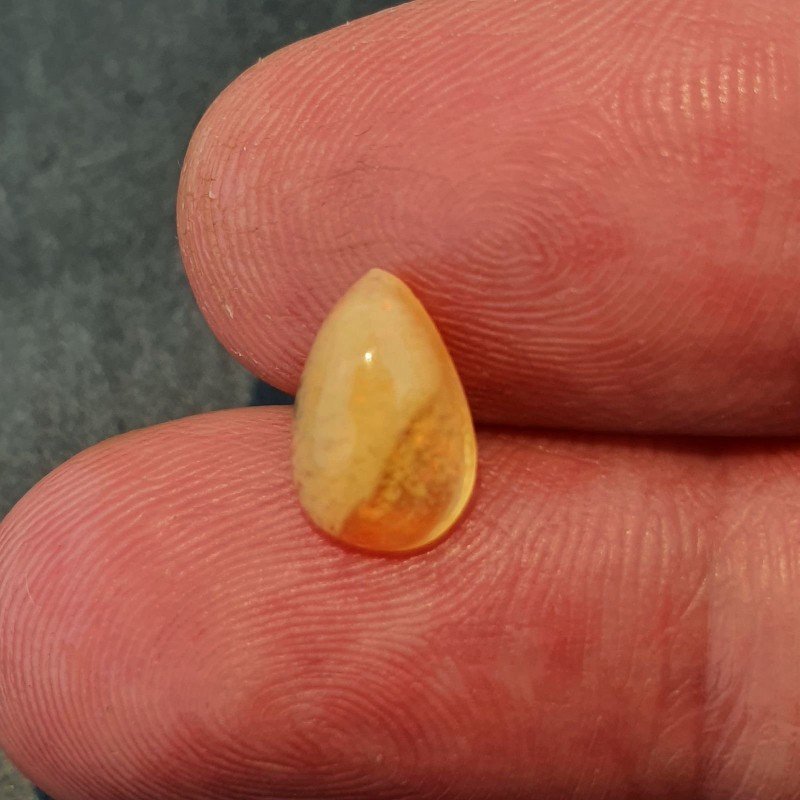 Opale Etiope 'Welo' Naturale Forma Goccia Piatto Cabochon Liscio Fatto a Mano 6x10x4mm 1,05 Carati 1pz
