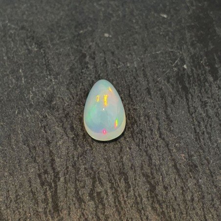 Opale Etiope 'Welo' Naturale Forma Goccia Piatto Cabochon Liscio Fatto a Mano 10x6x5mm 1,55 Carati 1pz