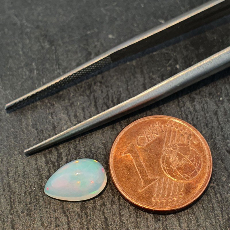 Opale Etiope 'Welo' Naturale Forma Goccia Piatto Cabochon Liscio Fatto a Mano 10x6x5mm 1,55 Carati 1pz