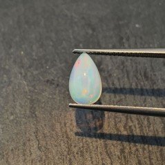 Opale Etiope 'Welo' Naturale Forma Goccia Piatto Cabochon Liscio Fatto a Mano 10x6x5mm 1,55 Carati 1pz