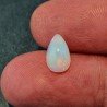 Opale Etiope 'Welo' Naturale Forma Goccia Piatto Cabochon Liscio Fatto a Mano 10x6x5mm 1,55 Carati 1pz
