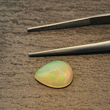 Opale Etiope 'Welo' Naturale Forma Goccia Piatto Cabochon Liscio Fatto a Mano 11x8x5mm 1,90 Carati 1pz
