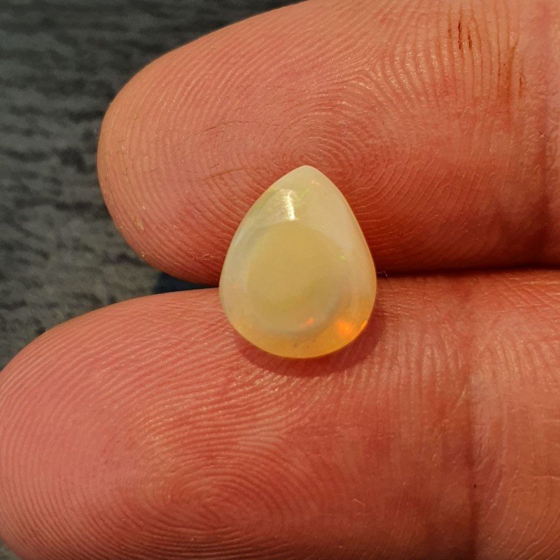 Opale Etiope 'Welo' Naturale Forma Goccia Piatto Cabochon Liscio Fatto a Mano 10x8x6mm 1,95 Carati 1pz