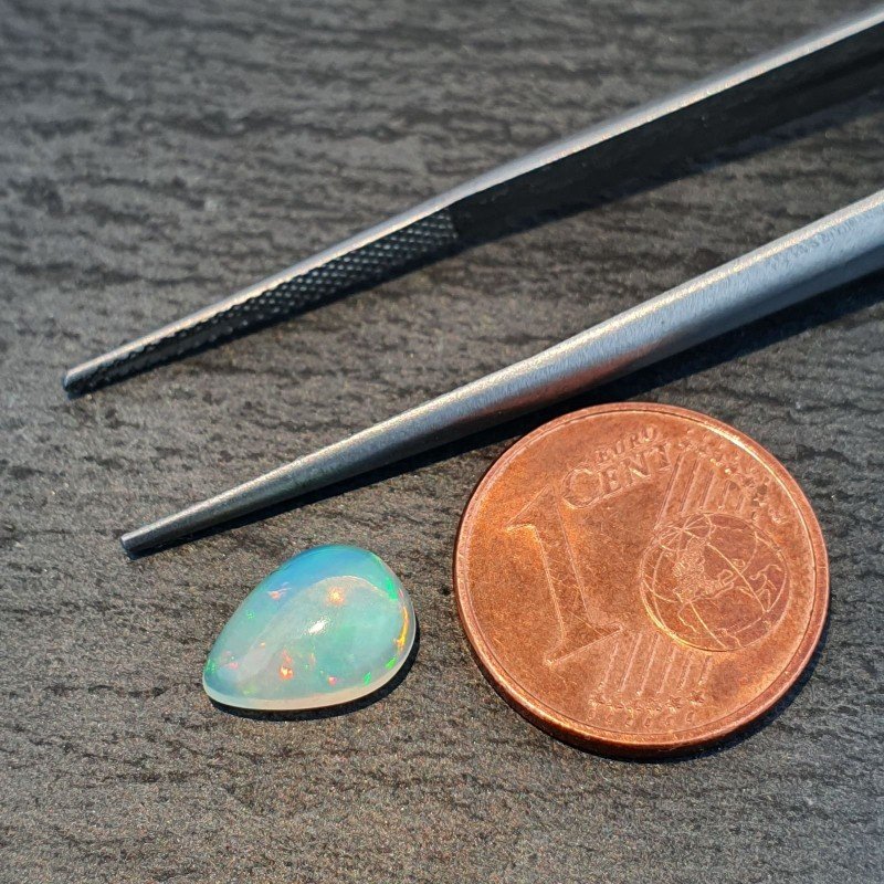 Opale Etiope 'Welo' Naturale Forma Goccia Piatto Cabochon Liscio Fatto a Mano 10x7x4mm 1,20 Carati 1pz