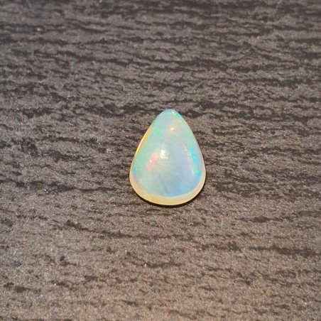 Opale Etiope 'Welo' Naturale Forma Goccia Piatto Cabochon Liscio Fatto a Mano 10x8x4mm 1,40 Carati 1pz