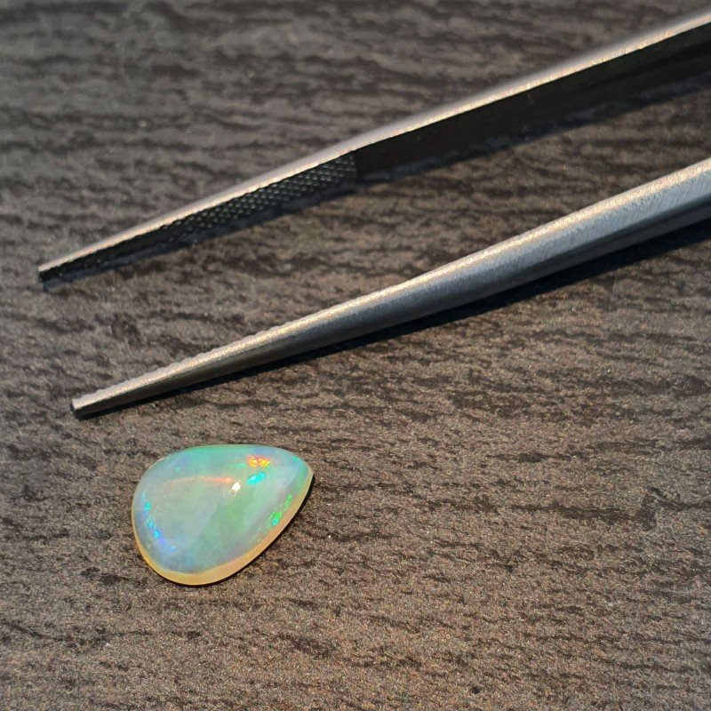 Opale Etiope 'Welo' Naturale Forma Goccia Piatto Cabochon Liscio Fatto a Mano 10x8x4mm 1,40 Carati 1pz