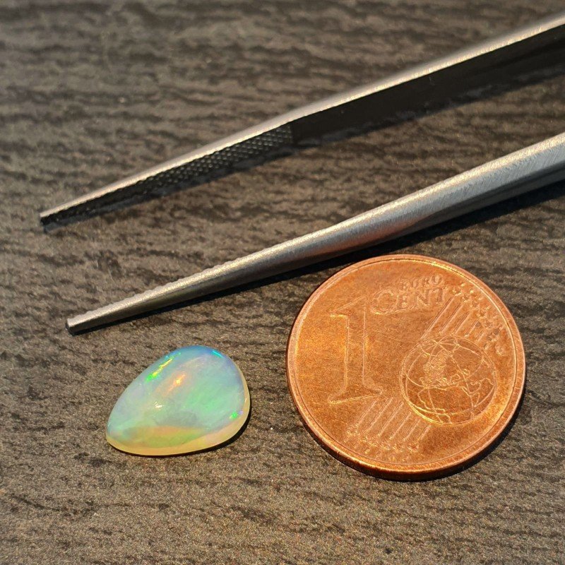 Opale Etiope 'Welo' Naturale Forma Goccia Piatto Cabochon Liscio Fatto a Mano 10x8x4mm 1,40 Carati 1pz