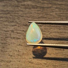 Opale Etiope 'Welo' Naturale Forma Goccia Piatto Cabochon Liscio Fatto a Mano 10x8x4mm 1,40 Carati 1pz