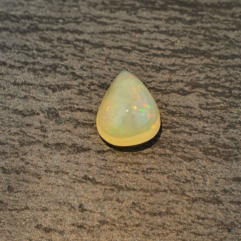 Opale Etiope 'Welo' Naturale Forma Goccia Piatto Cabochon Liscio Fatto a Mano 10x8x6mm 2,10 Carati 1pz