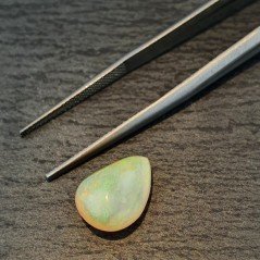 Opale Etiope 'Welo' Naturale Forma Goccia Piatto Cabochon Liscio Fatto a Mano 13X10X6,60mm 3,45 Carati 1pz