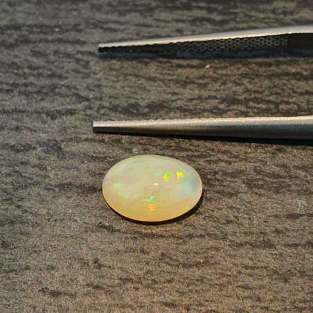 Opale Etiope 'Welo' Naturale Forma Ovale Piatto Cabochon Liscio Fatto a Mano 10X7X4mm 1.35 Carati 1pz