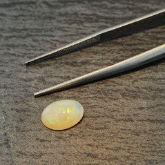 Opale Etiope 'Welo' Naturale Forma Ovale Piatto Cabochon Liscio Fatto a Mano 10X7X4mm 1.35 Carati 1pz