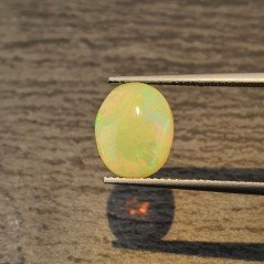 Opale Etiope 'Welo' Naturale Forma Ovale Piatto Cabochon Liscio Fatto a Mano 11,4X9X5mm 2,45 Carati 1pz