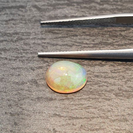 Opale Etiope 'Welo' Naturale Forma Ovale Piatto Cabochon Liscio Fatto a Mano 10X8,5X5mm 1.90 Carati 1pz