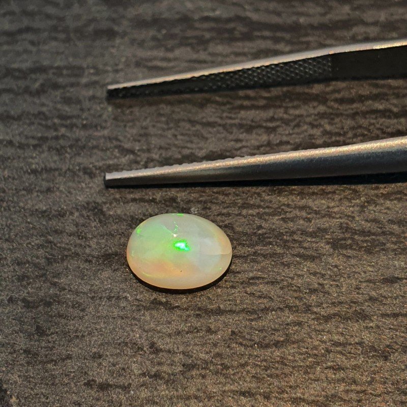 Opale Etiope 'Welo' Naturale Forma Ovale Piatto Cabochon Liscio Fatto a Mano 6,5X8,5X4,5mm 1,20 Carati 1pz