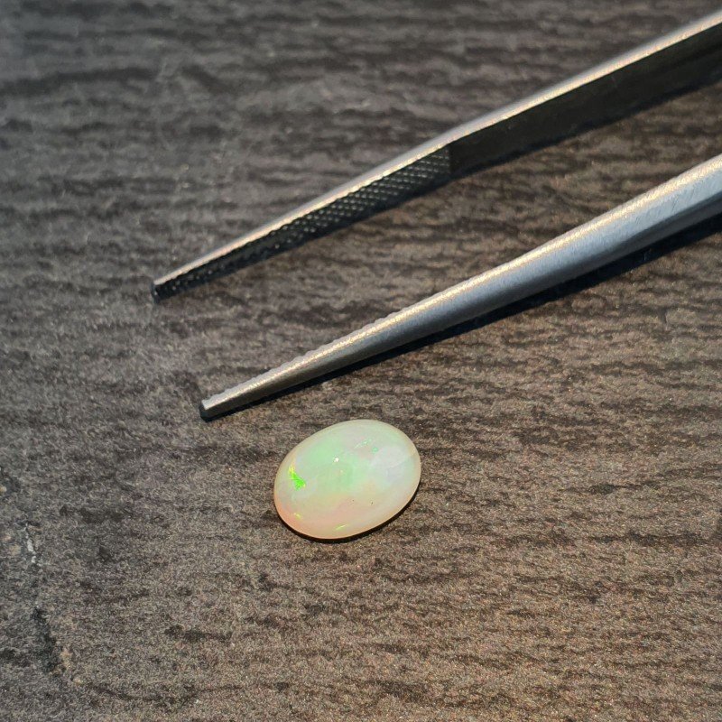 Opale Etiope 'Welo' Naturale Forma Ovale Piatto Cabochon Liscio Fatto a Mano 6,5X8,5X4,5mm 1,20 Carati 1pz