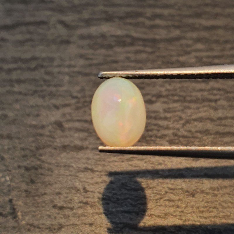 Opale Etiope 'Welo' Naturale Forma Ovale Piatto Cabochon Liscio Fatto a Mano 6,5X8,5X4,5mm 1,20 Carati 1pz