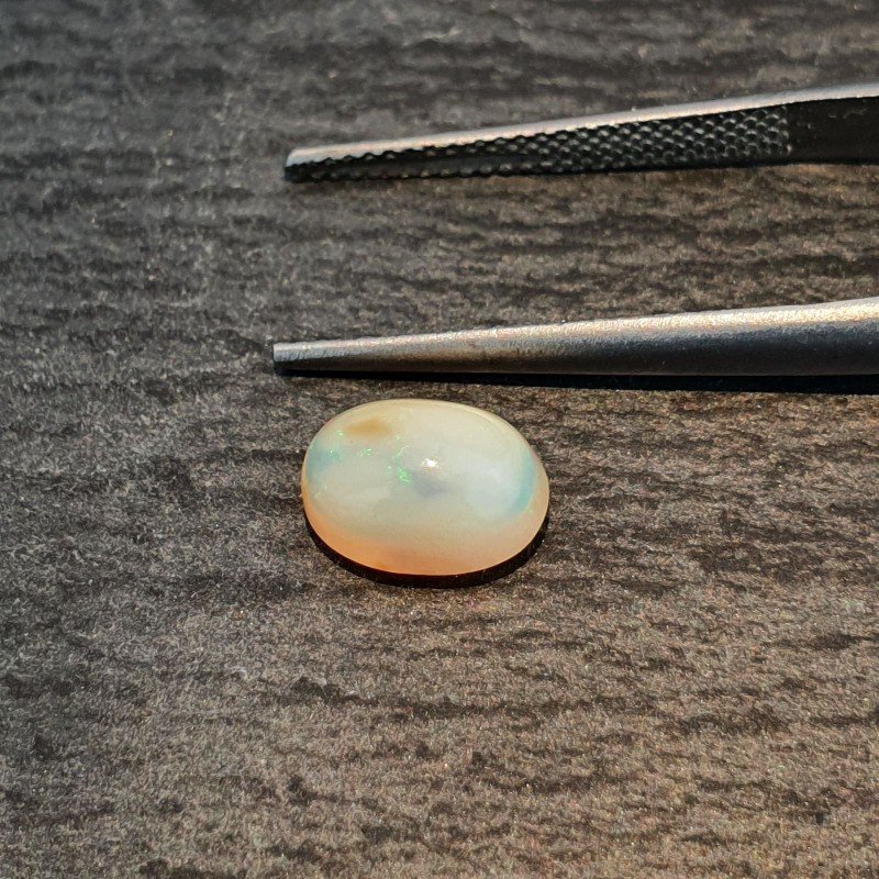 Opale Etiope 'Welo' Naturale Forma Ovale Piatto Cabochon Liscio Fatto a Mano 9X6,40X5mm 1.45 Carati 1pz