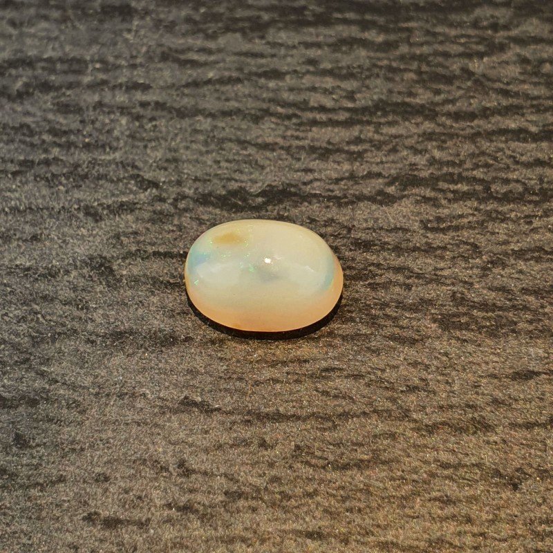 Opale Etiope 'Welo' Naturale Forma Ovale Piatto Cabochon Liscio Fatto a Mano 9X6,40X5mm 1.45 Carati 1pz