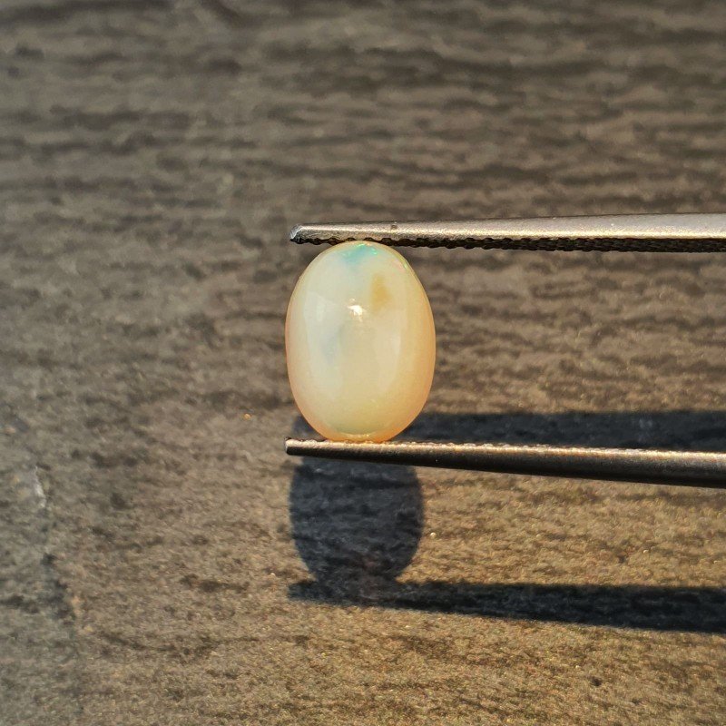 Opale Etiope 'Welo' Naturale Forma Ovale Piatto Cabochon Liscio Fatto a Mano 9X6,40X5mm 1.45 Carati 1pz