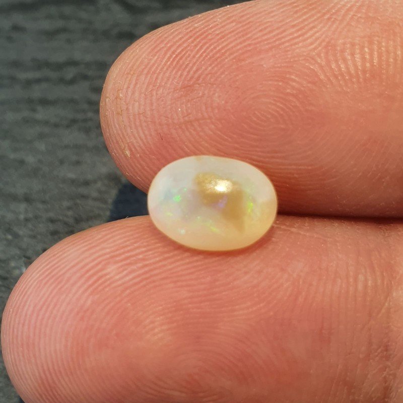Opale Etiope 'Welo' Naturale Forma Ovale Piatto Cabochon Liscio Fatto a Mano 9X6,40X5mm 1.45 Carati 1pz