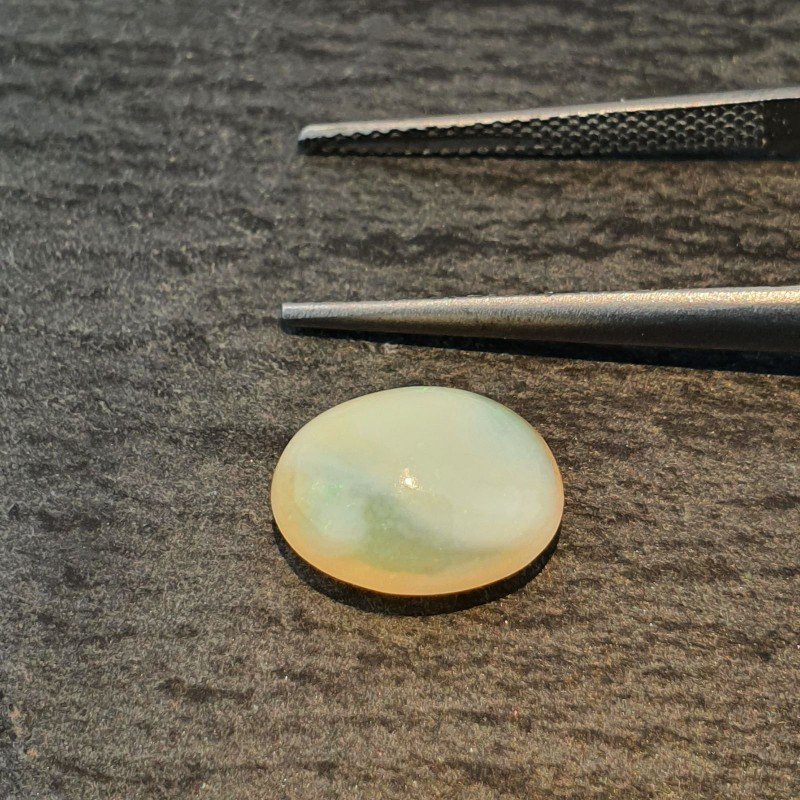 Opale Etiope 'Welo' Naturale Forma Ovale Piatto Cabochon Liscio Fatto a Mano 11X9X5,40mm 2,35 Carati 1pz Opale Etiope 'Welo' Naturale Forma Ovale Piatto Cabochon Liscio Fatto a Mano 11X9X5,40mm 2,35 Carati 1pz