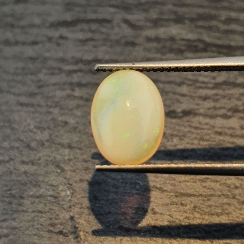 Opale Etiope 'Welo' Naturale Forma Ovale Piatto Cabochon Liscio Fatto a Mano 11X9X5,40mm 2,35 Carati 1pz Opale Etiope 'Welo' Naturale Forma Ovale Piatto Cabochon Liscio Fatto a Mano 11X9X5,40mm 2,35 Carati 1pz