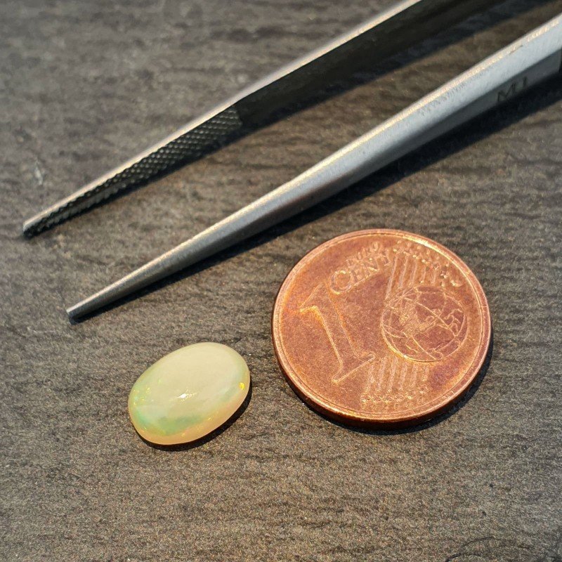 Opale Etiope 'Welo' Naturale Forma Ovale Piatto Cabochon Liscio Fatto a Mano 9X7X3,4mm 1.10 Carati 1pz