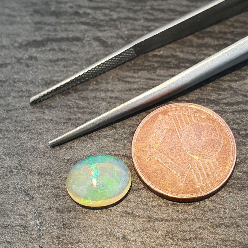 Opale Etiope 'Welo' Naturale Forma Ovale Piatto Cabochon Liscio Fatto a Mano 10X8X4mm 1.65 Carati 1pz