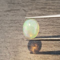 Opale Etiope 'Welo' Naturale Forma Ovale Piatto Cabochon Liscio Fatto a Mano 10X8X4mm 1.65 Carati 1pz