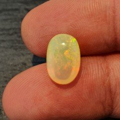 Opale Etiope 'Welo' Naturale Forma Ovale Piatto Cabochon Liscio Fatto a Mano 12X8X5,70mm 2,30 Carati 1pz Opale Etiope 'Welo' Naturale Forma Ovale Piatto Cabochon Liscio Fatto a Mano 12X8X5,70mm 2,30 Carati 1pz