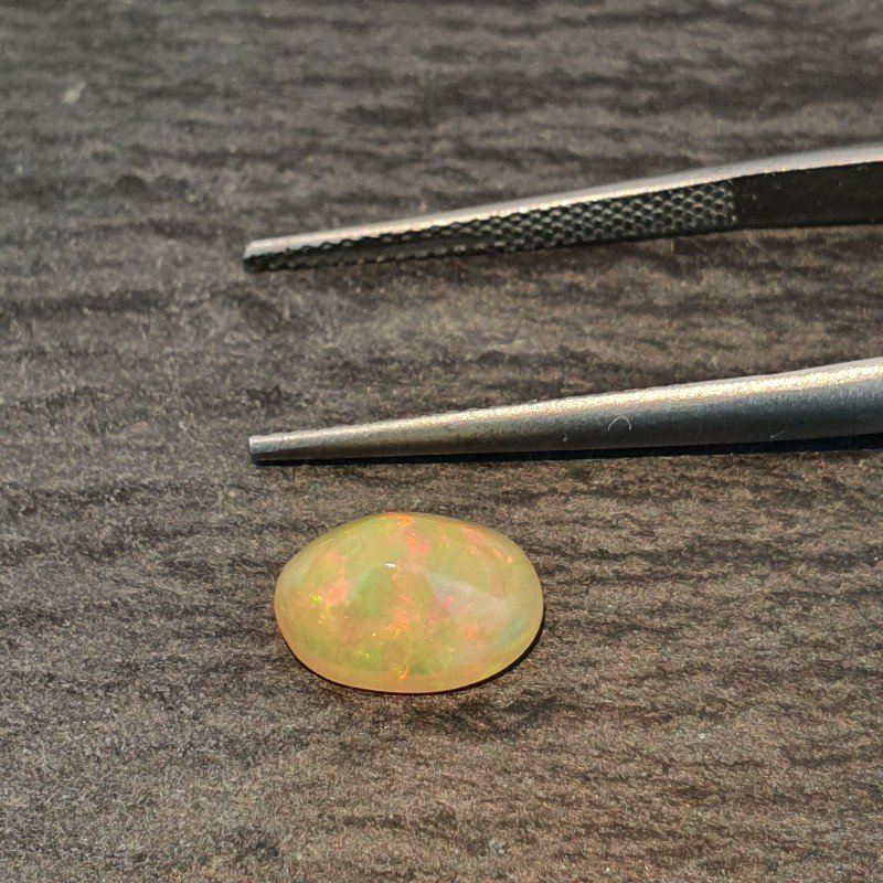 Opale Etiope 'Welo' Naturale Forma Ovale Piatto Cabochon Liscio Fatto a Mano 10X7X5,40mm 1.75 Carati 1pz
