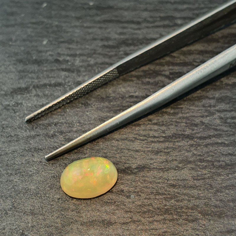 Opale Etiope 'Welo' Naturale Forma Ovale Piatto Cabochon Liscio Fatto a Mano 10X7X5,40mm 1.75 Carati 1pz