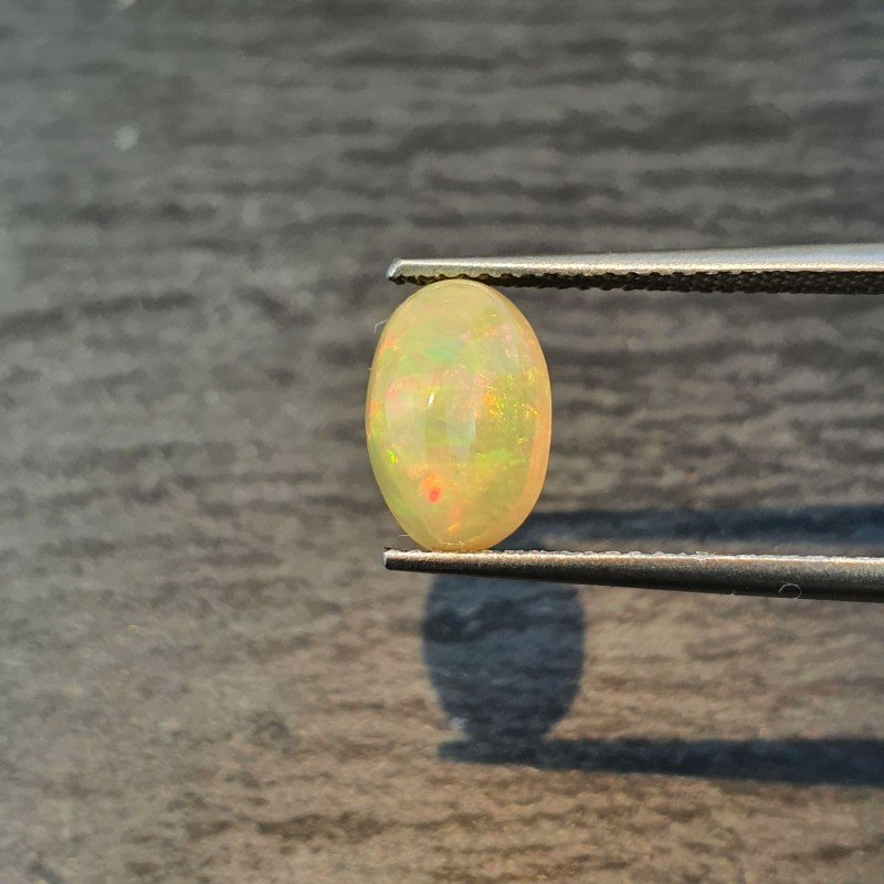 Opale Etiope 'Welo' Naturale Forma Ovale Piatto Cabochon Liscio Fatto a Mano 10X7X5,40mm 1.75 Carati 1pz