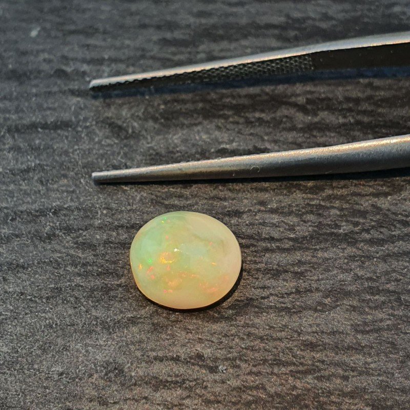 Opale Etiope 'Welo' Naturale Forma Ovale Piatto Cabochon Liscio Fatto a Mano 9X8X6mm 1.90 Carati 1pz