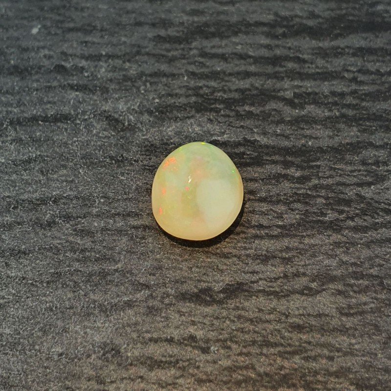 Opale Etiope 'Welo' Naturale Forma Ovale Piatto Cabochon Liscio Fatto a Mano 9X8X6mm 1.90 Carati 1pz