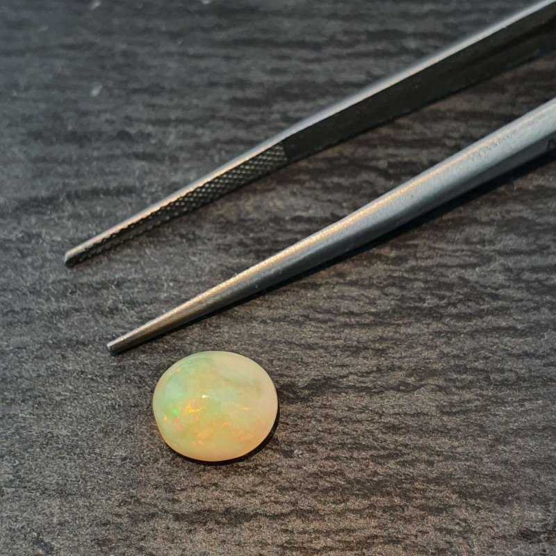 Opale Etiope 'Welo' Naturale Forma Ovale Piatto Cabochon Liscio Fatto a Mano 9X8X6mm 1.90 Carati 1pz