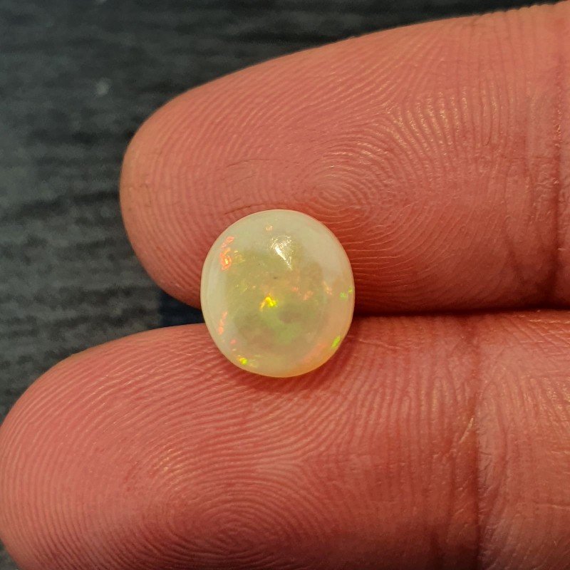 Opale Etiope 'Welo' Naturale Forma Ovale Piatto Cabochon Liscio Fatto a Mano 9X8X6mm 1.90 Carati 1pz