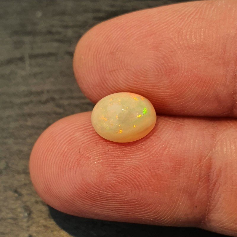 Opale Etiope 'Welo' Naturale Forma Ovale Piatto Cabochon Liscio Fatto a Mano 10X8X5,60mm 1.90 Carati 1pz