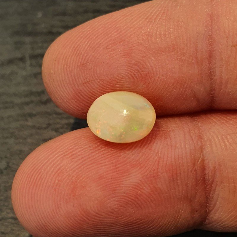 Opale Etiope 'Welo' Naturale Forma Ovale Piatto Cabochon Liscio Fatto a Mano 10X8X5,60mm 1.90 Carati 1pz