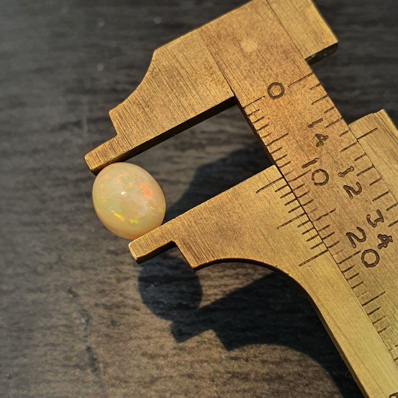 Opale Etiope 'Welo' Naturale Forma Ovale Piatto Cabochon Liscio Fatto a Mano 10X8X5,60mm 1.90 Carati 1pz