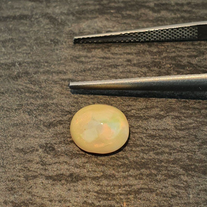 Opale Etiope 'Welo' Naturale Forma Ovale Piatto Cabochon Liscio Fatto a Mano 9X8X5mm 1.65 Carati 1pz