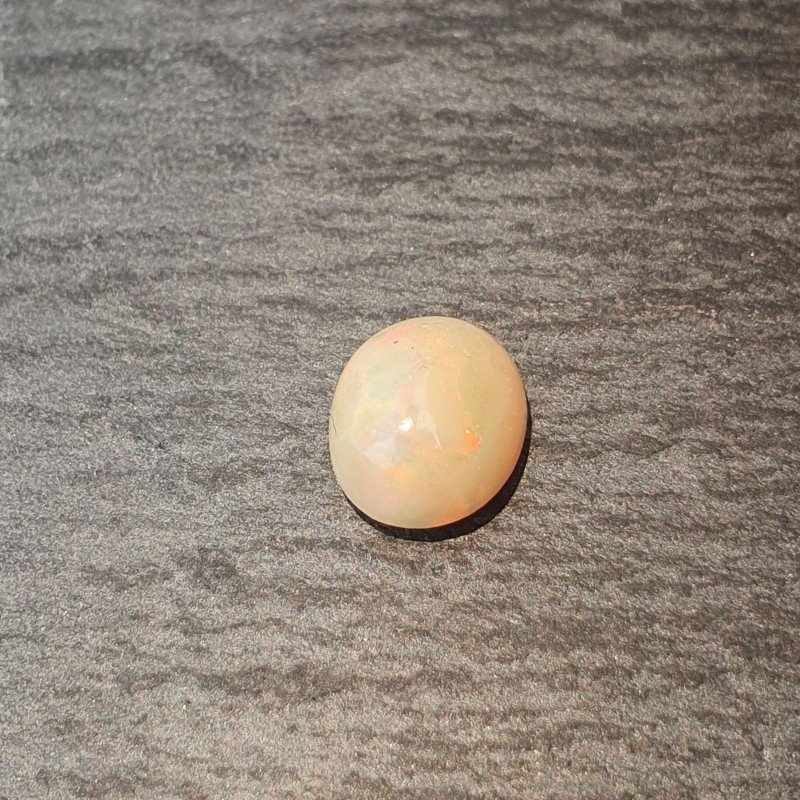 Opale Etiope 'Welo' Naturale Forma Ovale Piatto Cabochon Liscio Fatto a Mano 9X8X5mm 1.65 Carati 1pz