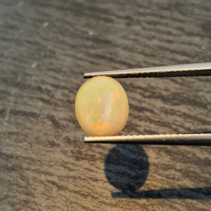 Opale Etiope 'Welo' Naturale Forma Ovale Piatto Cabochon Liscio Fatto a Mano 9X8X5mm 1.65 Carati 1pz