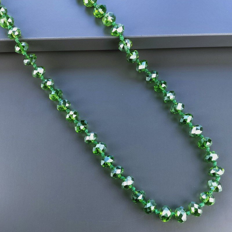 Collana cristallo verde trasparente rondelle sfac 10 mm annodato 125 cm Collana cristallo verde trasparente rondelle sfac 10 mm annodato 125 cm