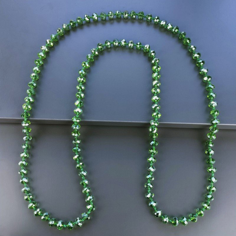 Collana cristallo verde trasparente rondelle sfac 10 mm annodato 125 cm Collana cristallo verde trasparente rondelle sfac 10 mm annodato 125 cm